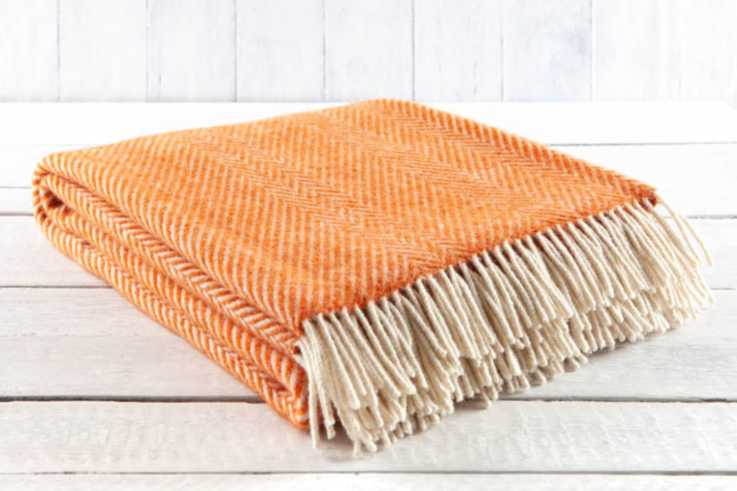 Cotswold Warmth: Stylish Authentic Shetland Chevron Blanket in Radiant Orange