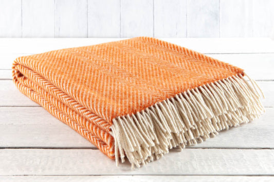 Cotswold Warmth: Stylish Authentic Shetland Chevron Blanket in Radiant Orange